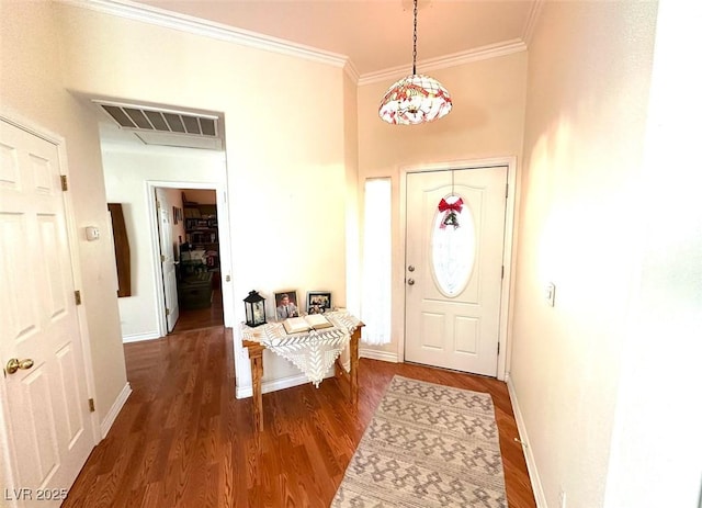 entryway featuring dark hardwood / wood-style flooring and ornamental molding