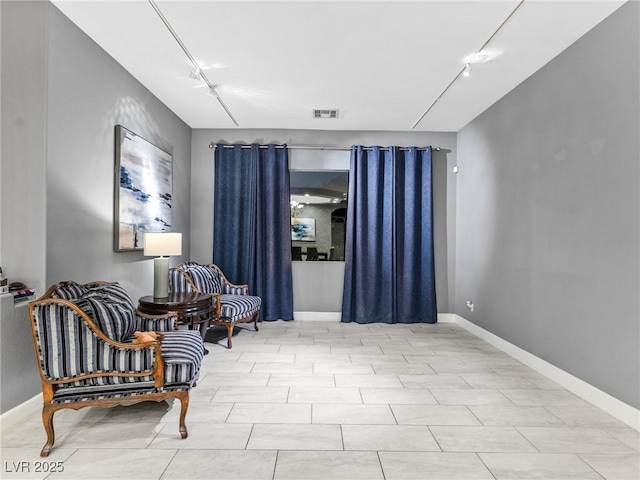 sitting room with track lighting