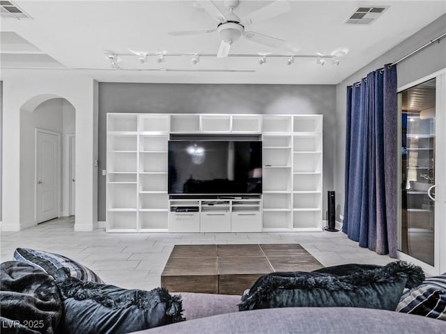 living room with ceiling fan