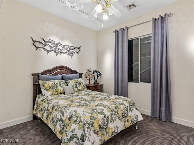 carpeted bedroom featuring a closet and ceiling fan