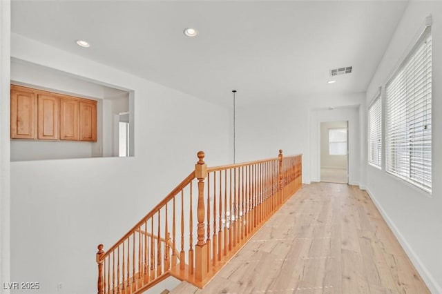 hallway featuring light hardwood / wood-style flooring