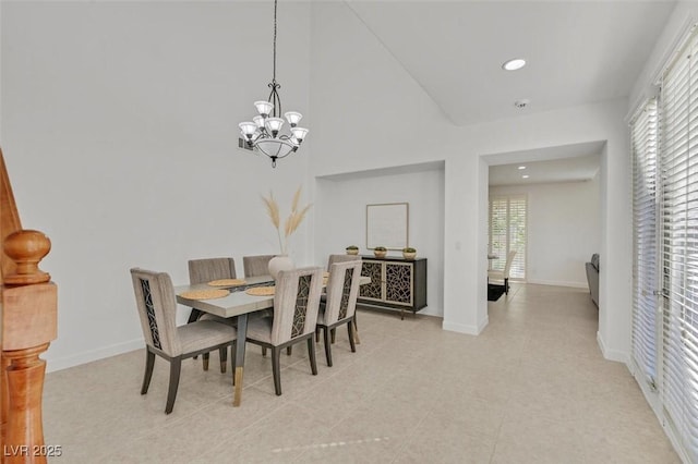 dining space featuring an inviting chandelier