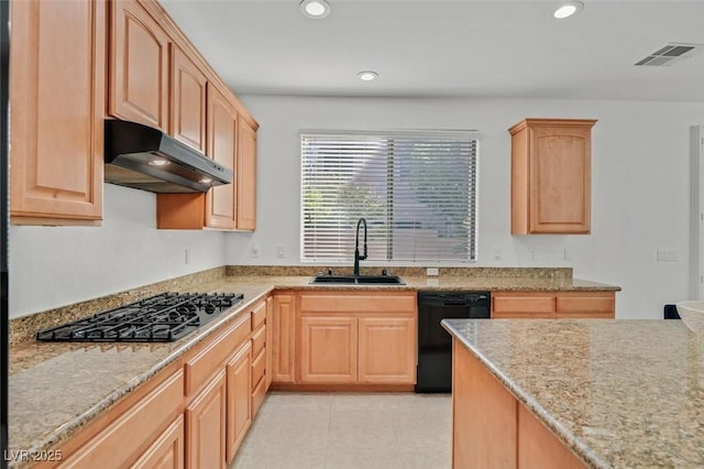 kitchen featuring sink, dishwasher, light brown cabinetry, and stainless steel gas cooktop