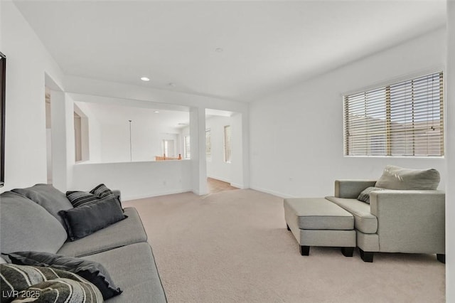 living room featuring light colored carpet