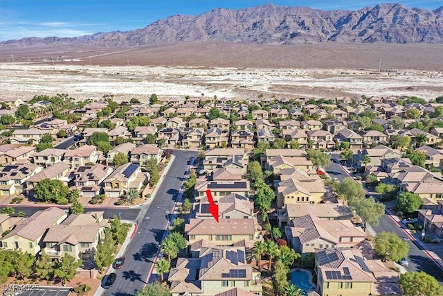 drone / aerial view featuring a mountain view