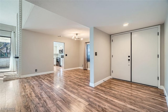 entrance foyer with light hardwood / wood-style floors