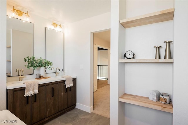 bathroom with tile patterned floors and vanity