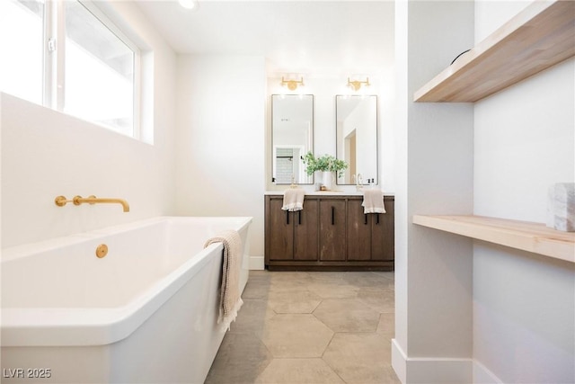 bathroom featuring a bathing tub and vanity