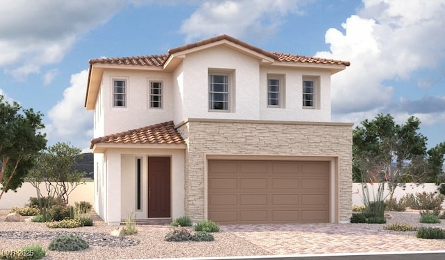 mediterranean / spanish-style house featuring a garage