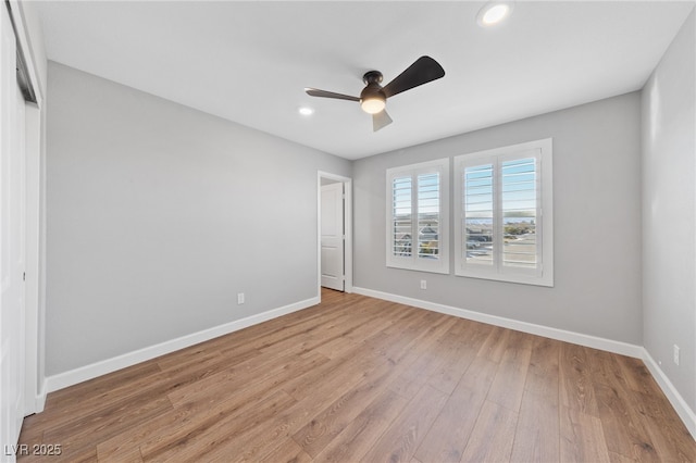 unfurnished bedroom featuring ceiling fan and light hardwood / wood-style floors