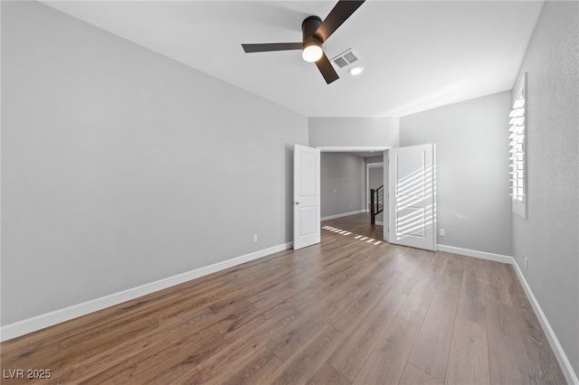 unfurnished bedroom featuring ceiling fan and hardwood / wood-style floors