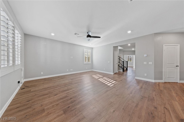 interior space featuring hardwood / wood-style flooring and ceiling fan