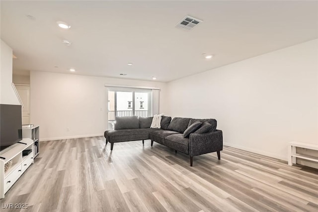 living room featuring light wood-type flooring