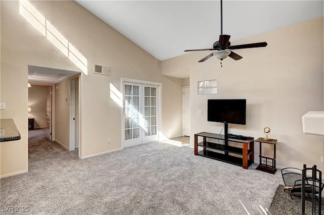 living room featuring french doors, high vaulted ceiling, carpet floors, and ceiling fan