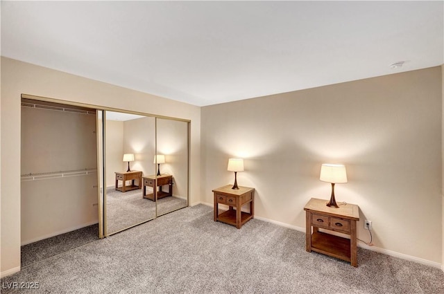 sitting room with carpet flooring