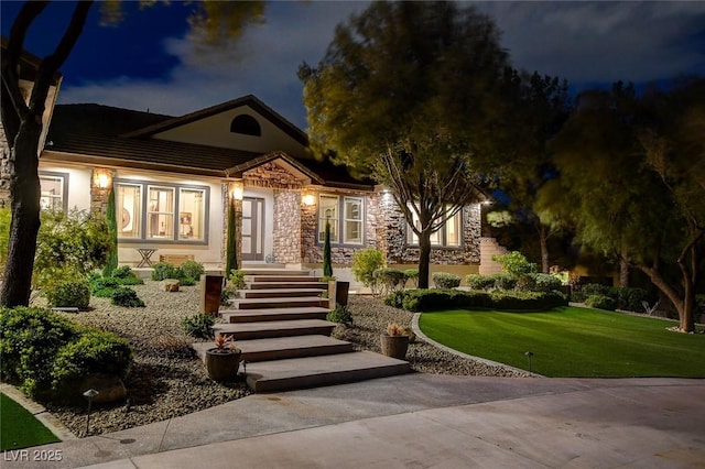 view of front facade with a front yard