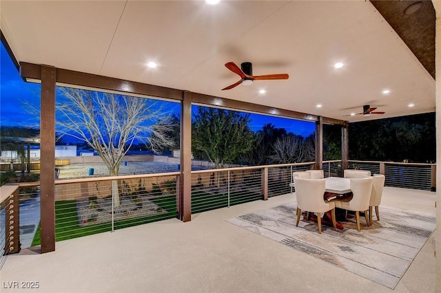 view of patio featuring ceiling fan