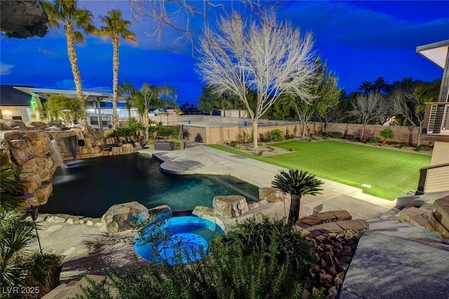 view of swimming pool with a lawn, an in ground hot tub, and a patio area