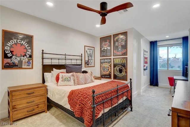 carpeted bedroom featuring ceiling fan