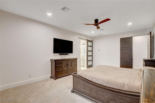 bedroom featuring light colored carpet and ceiling fan