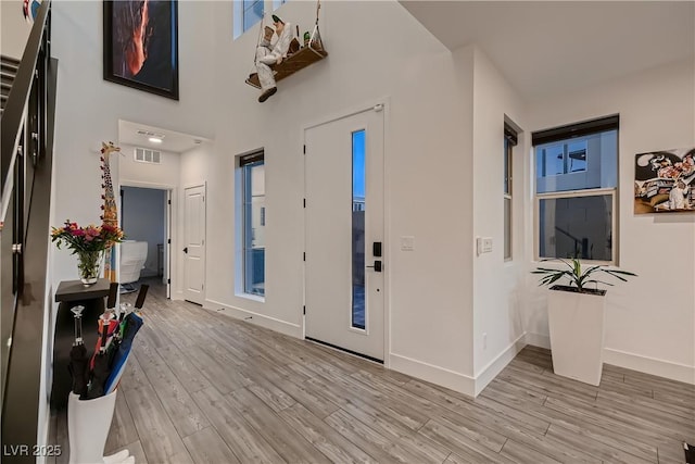 entryway with light wood-type flooring