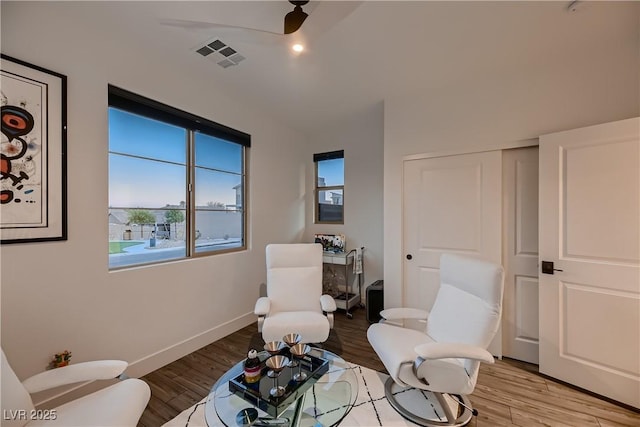 sitting room featuring hardwood / wood-style flooring