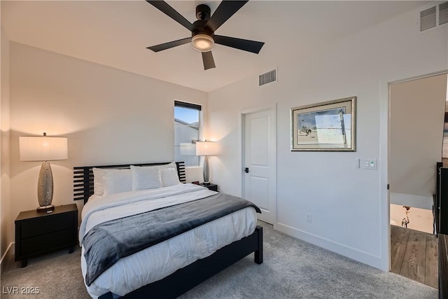 bedroom with light colored carpet and ceiling fan