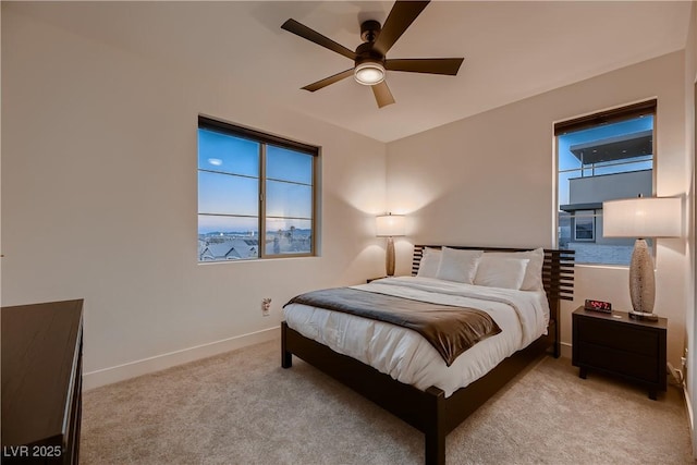 6289 Redstone Hills Dr, Las Vegas, NV 89148 - bedroom featuring light carpet, baseboards, and a ceiling fan