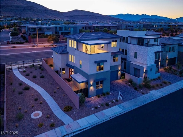 6289 Redstone Hills Dr, Las Vegas, NV 89148 - aerial view at dusk of a mountain view