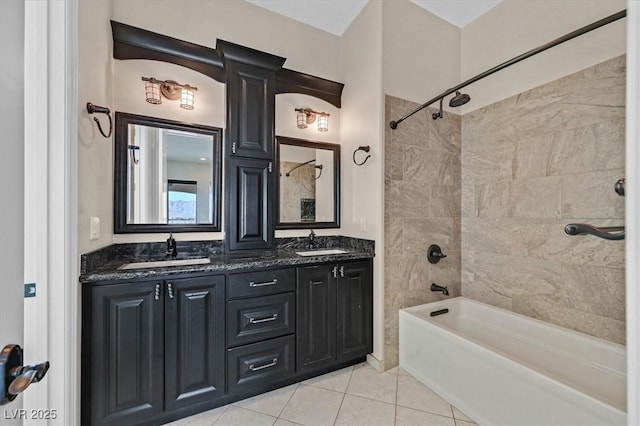 full bathroom with tile patterned flooring, shower / tub combination, double vanity, and a sink