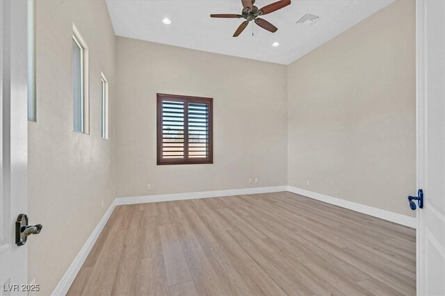 unfurnished room featuring ceiling fan and light hardwood / wood-style flooring