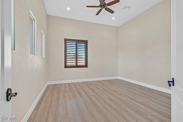 empty room with visible vents, baseboards, ceiling fan, light wood-type flooring, and recessed lighting