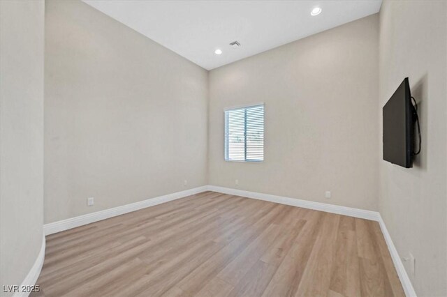 unfurnished room featuring light wood-type flooring