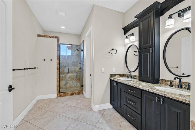 bathroom featuring vanity, walk in shower, and tile patterned flooring