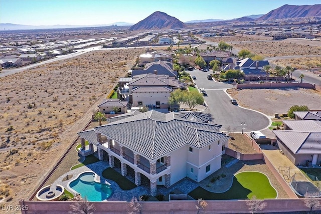 bird's eye view featuring a mountain view and a residential view