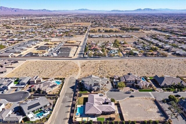 drone / aerial view featuring a mountain view