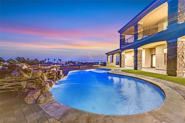 pool with a patio