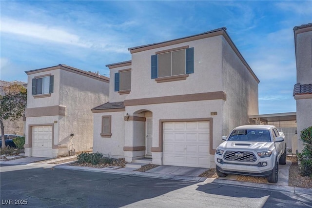 front of property with a garage