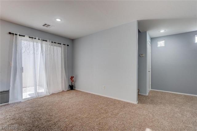 spare room featuring carpet flooring