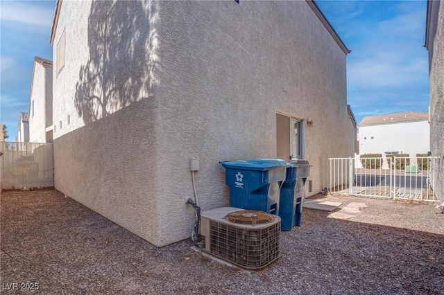 view of property exterior featuring central air condition unit