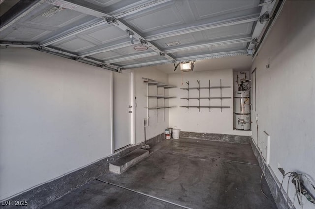 garage featuring a garage door opener and secured water heater