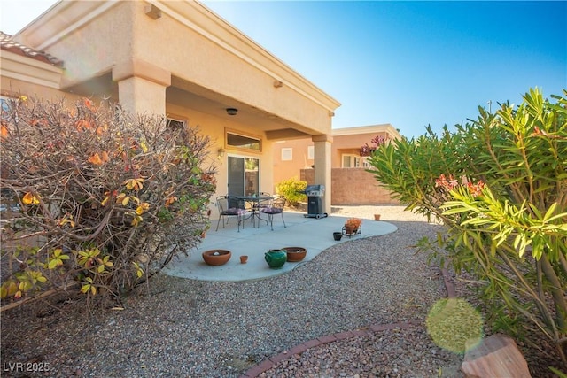 rear view of house featuring a patio area