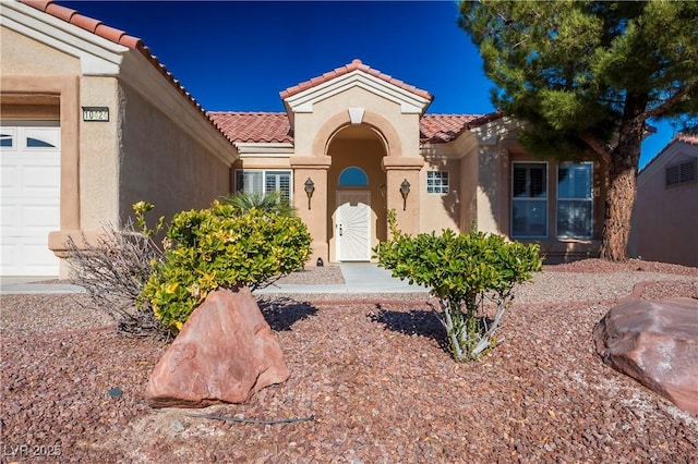 view of front of house with a garage