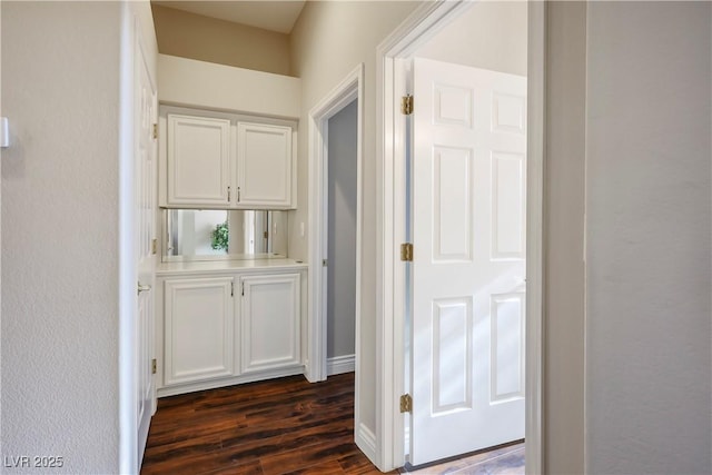 hall featuring dark hardwood / wood-style floors