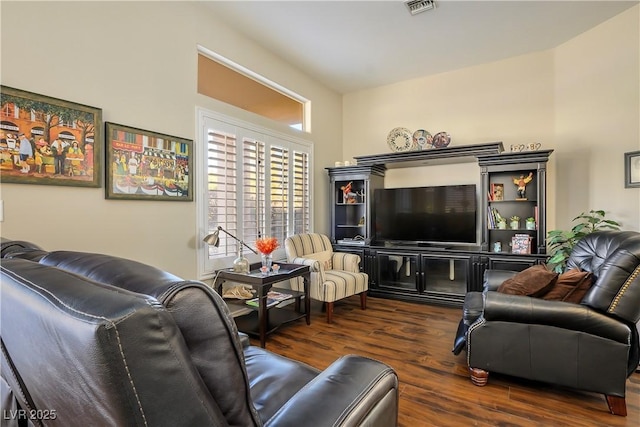 living room with dark hardwood / wood-style floors