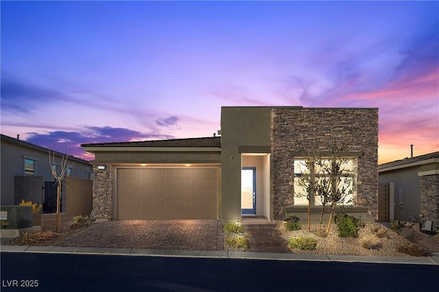 modern home featuring a garage