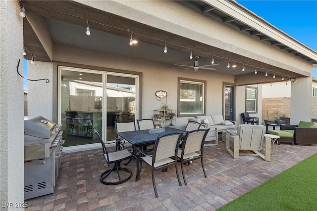 view of patio with ceiling fan, outdoor lounge area, and area for grilling