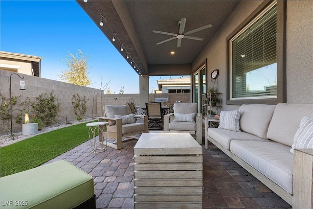 view of patio featuring ceiling fan and an outdoor hangout area