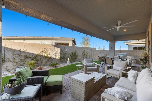 view of patio / terrace featuring an outdoor hangout area, ceiling fan, and area for grilling