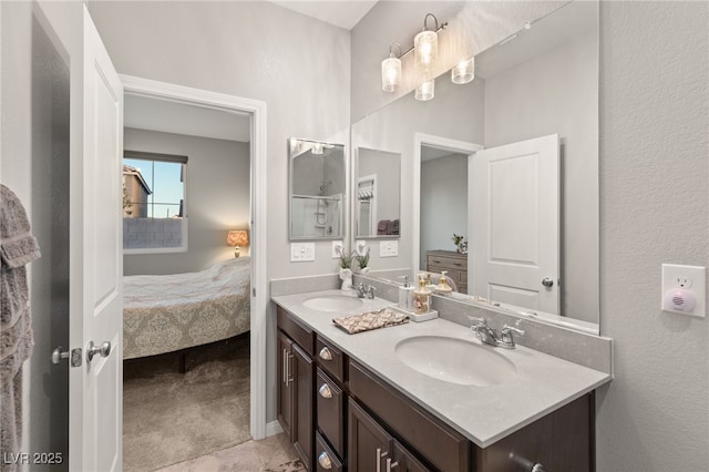 bathroom with vanity and tile patterned flooring